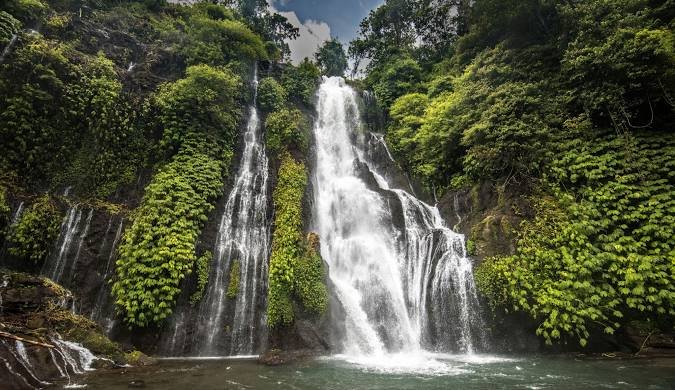 Banyumala Twin Waterfall surrounded by lush greenery in Bali, Indonesia